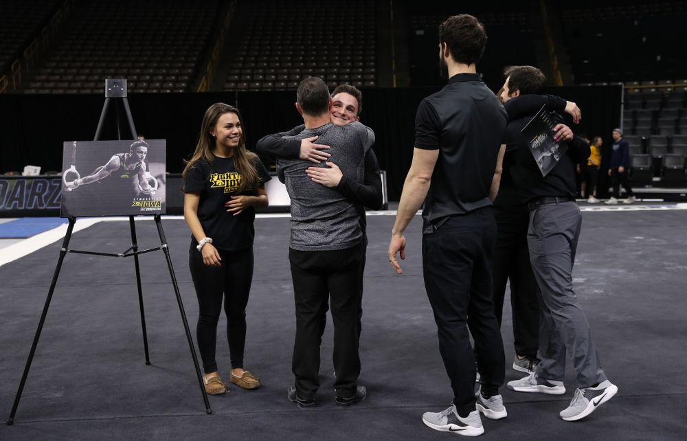 Iowa Men's Gymnast Jake Brodarzon and his family during senior day ceremonies following their meet against the Ohio State Buckeyes Saturday, March 16, 2019 at Carver-Hawkeye Arena. (Brian Ray/hawkeyesports.com)