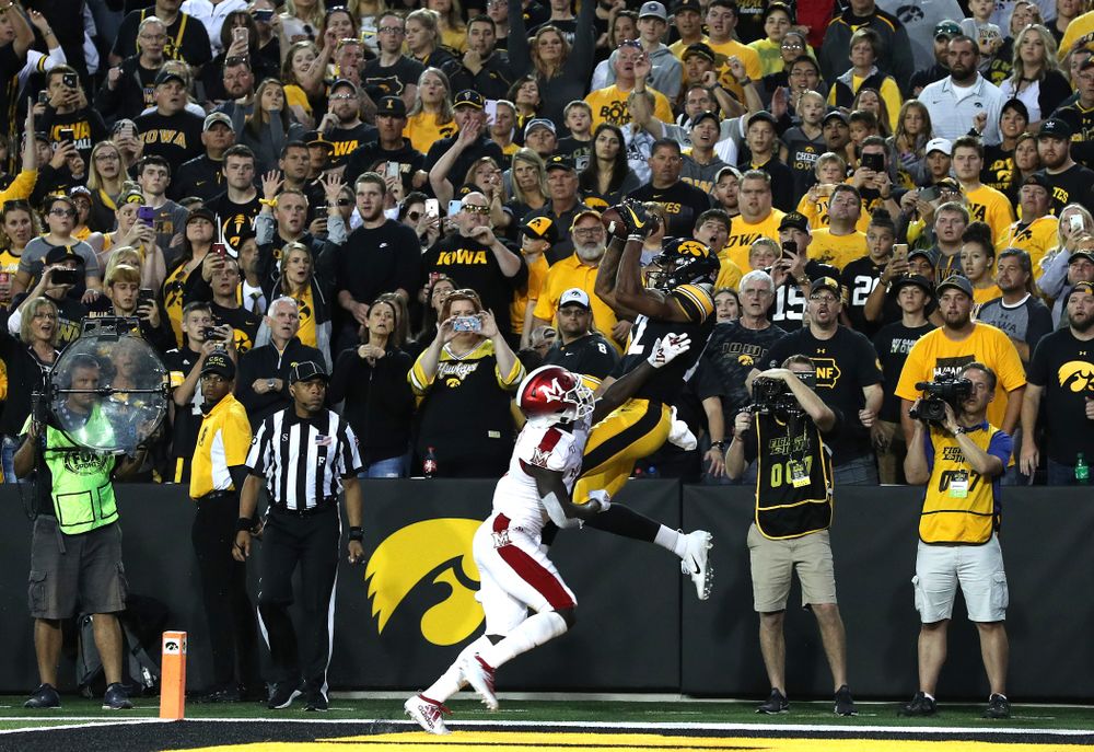 Iowa Hawkeyes wide receiver Brandon Smith (12) catches a touchdown against the Miami RedHawks Saturday, August 31, 2019 at Kinnick Stadium in Iowa City. (Brian Ray/hawkeyesports.com)