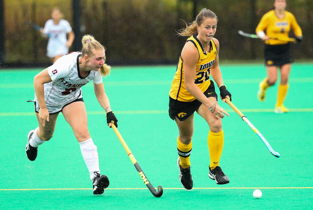 Iowa Hawkeyes midfielder Sophie Sunderland (20) dribbles during a game against Stanford at Grant Field on October 7, 2018. (Tork Mason/hawkeyesports.com)