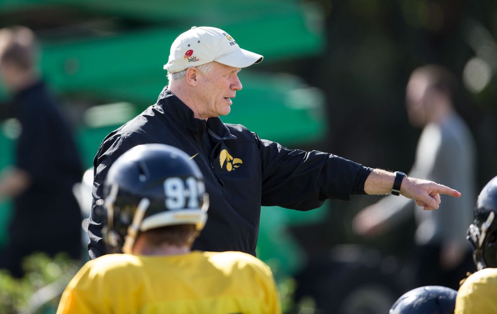 Iowa Hawkeyes defensive line coach Reese Morgan directs his players during the team's first Outback Bowl Practice Wednesday, Dec. 25, 2013 in Tampa. (Brian Ray/hawkeyesports.com)