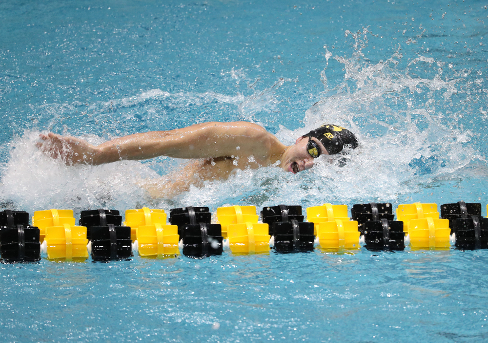 Iowa's Michael Tenney swims the third leg of the 800 freestyle relay at the 2019 Big Ten Swimming and Diving meet Wednesday, February 27, 2019 at the Campus Wellness and Recreation Center. (Brian Ray/hawkeyesports.com)