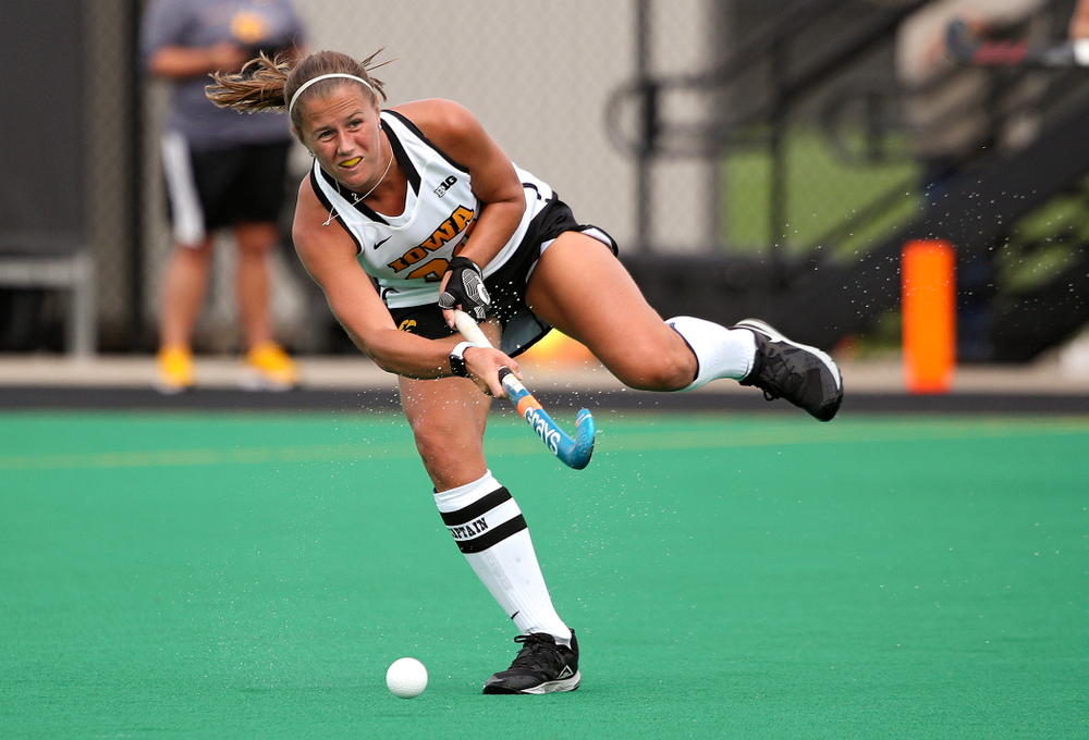 Iowa’s Sophie Sunderland (20) passes during the first quarter of their game at Grant Field in Iowa City on Friday, Sep 13, 2019. (Stephen Mally/hawkeyesports.com)