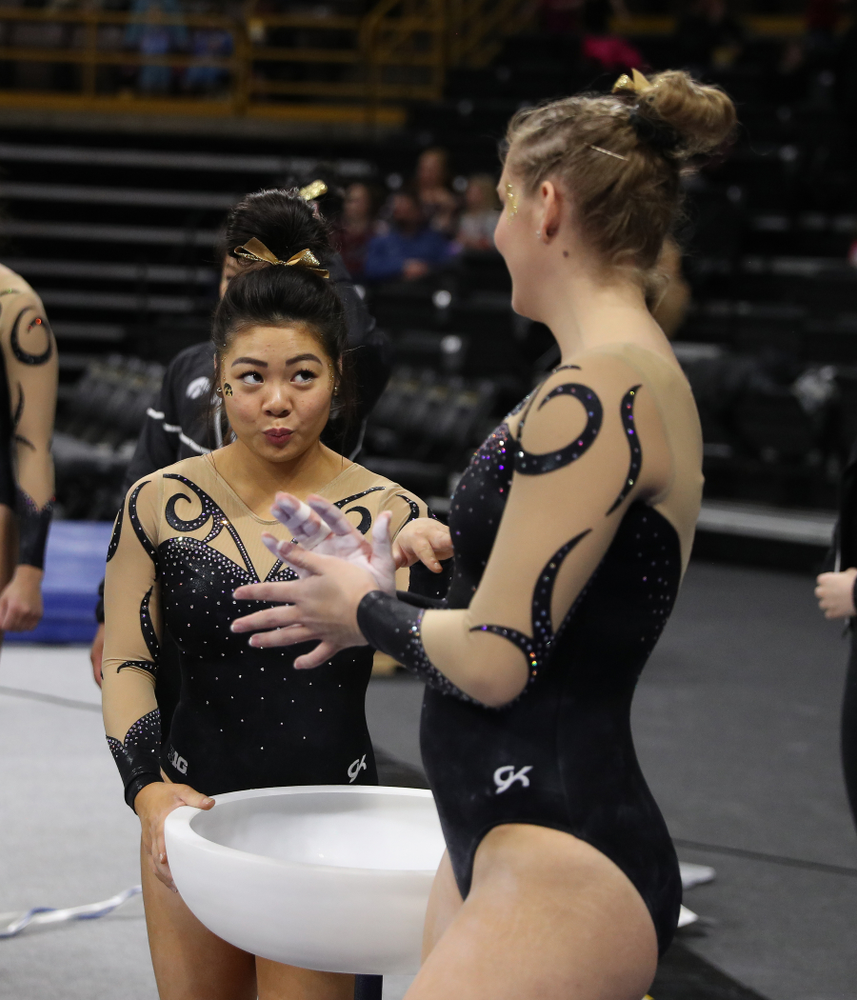 Iowa's Clair Kaji encourages teammate Emma Hartzler before her routine on the beam during their meet against Southeast Missouri State Friday, January 11, 2019 at Carver-Hawkeye Arena. (Brian Ray/hawkeyesports.com)
