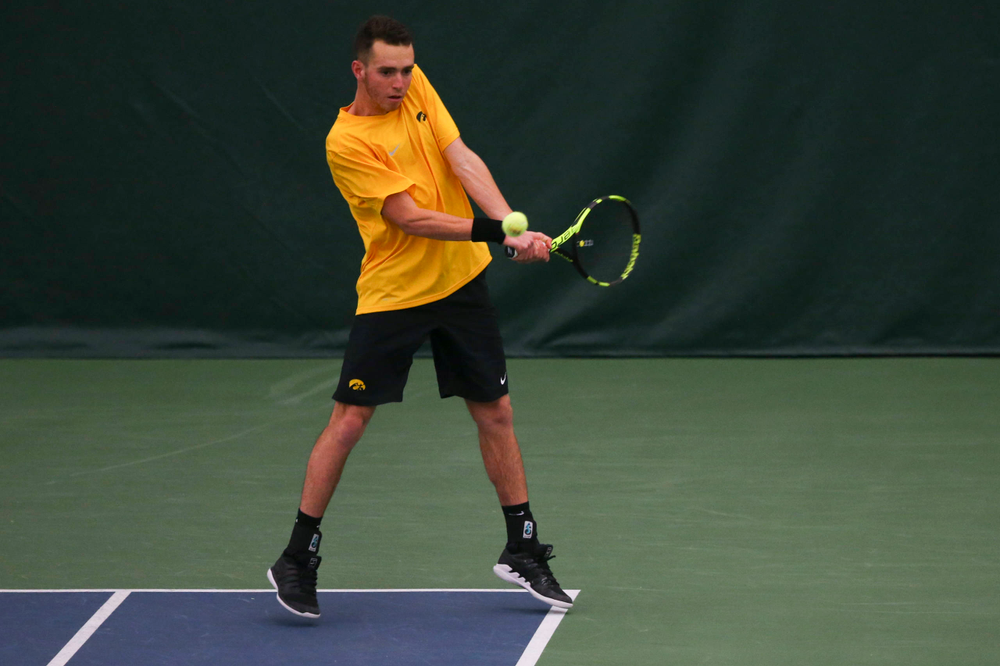 Iowa's Kareem Allaf at a tennis match vs Drake Friday, March 8, 2019 at the Hawkeye Tennis and Recreation Complex. (Lily Smith/hawkeyesports.com)
