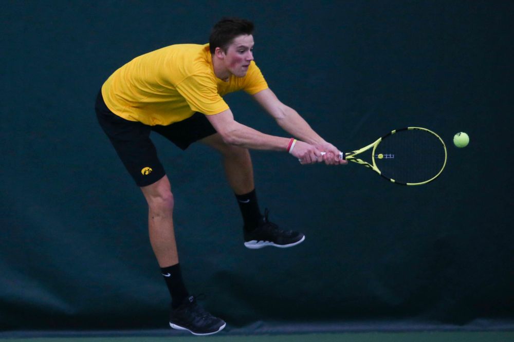 Iowa's Piotr Smietana at a tennis match vs Drake Friday, March 8, 2019 at the Hawkeye Tennis and Recreation Complex. (Lily Smith/hawkeyesports.com)