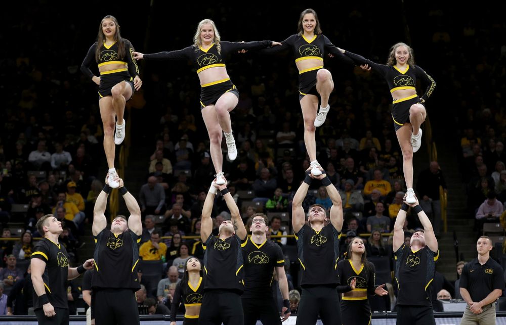 The Iowa Cheerleaders and Dance Team perform on senior night at half-time of the Iowa Hawkeyes game against the Purdue Boilermakers Tuesday, March 3, 2020 at Carver-Hawkeye Arena. (Brian Ray/hawkeyesports.com)