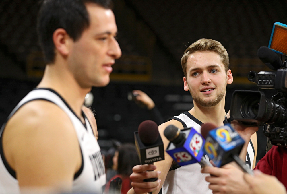 Iowa Hawkeyes forward Riley Till (20) waits to ask forward Ryan Kriener (15) a question during Iowa Men’s Basketball Media Day at Carver-Hawkeye Arena in Iowa City on Wednesday, Oct 9, 2019. (Stephen Mally/hawkeyesports.com)