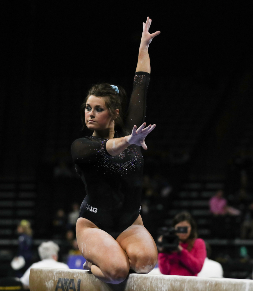 Iowa’s Erin Castle competes on the beam against Michigan Friday, February 14, 2020 at Carver-Hawkeye Arena. (Brian Ray/hawkeyesports.com)