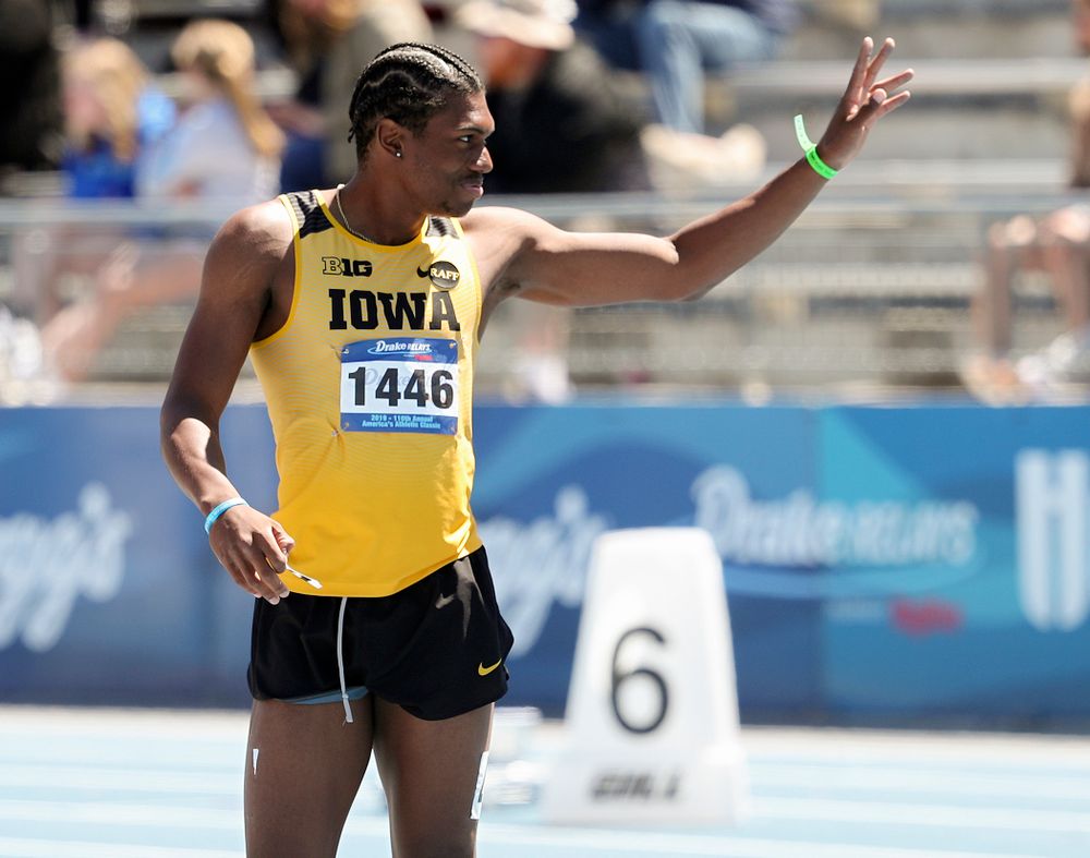 Iowa's Anthony Williams waves after running the men's 110 meter hurdles event during the second day of the Drake Relays at Drake Stadium in Des Moines on Friday, Apr. 26, 2019. (Stephen Mally/hawkeyesports.com)