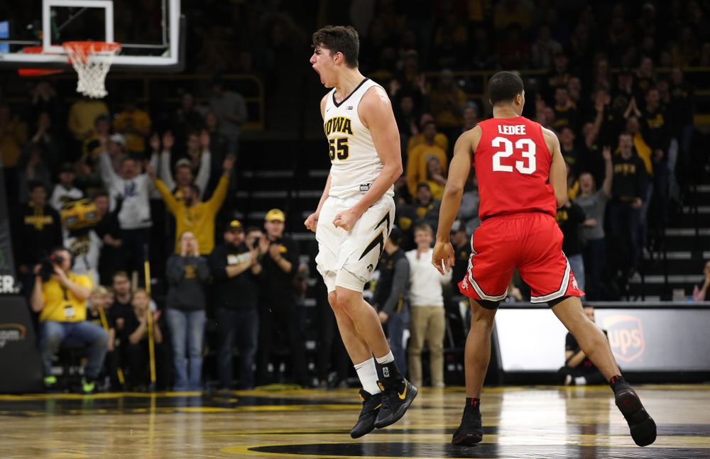 Iowa Hawkeyes forward Luka Garza (55) reacts after making a three point basket against the Ohio State Buckeyes Saturday, January 12, 2019 at Carver-Hawkeye Arena. (Brian Ray/hawkeyesports.com)