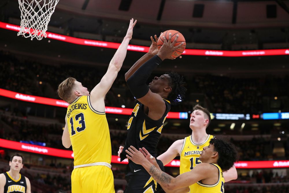 Iowa Hawkeyes forward Tyler Cook (25) against the Michigan Wolverines in the 2019 Big Ten Men's Basketball Tournament Friday, March 15, 2019 at the United Center in Chicago. (Brian Ray/hawkeyesports.com)