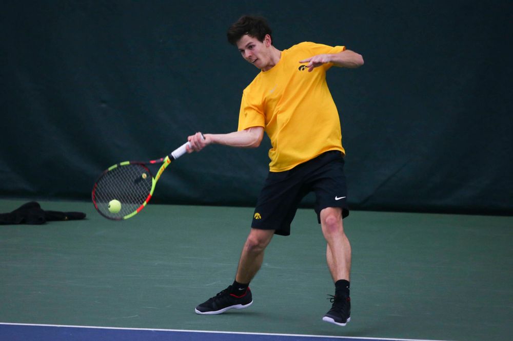Iowa's Joe Tyler at a tennis match vs Drake Friday, March 8, 2019 at the Hawkeye Tennis and Recreation Complex. (Lily Smith/hawkeyesports.com)