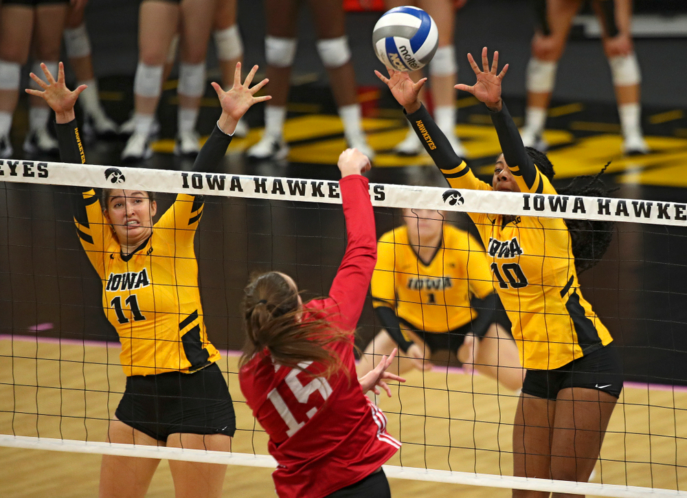 Iowa’s Griere Hughes (10) tries to block a shot during their match at Carver-Hawkeye Arena in Iowa City on Sunday, Oct 20, 2019. (Stephen Mally/hawkeyesports.com)