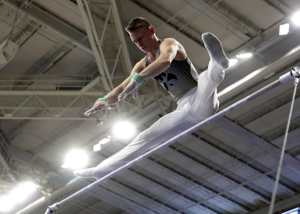 Iowa’s Carter Tope competes on the high bar against UIC and Minnesota Saturday, February 1, 2020 at Carver-Hawkeye Arena. (Brian Ray/hawkeyesports.com)