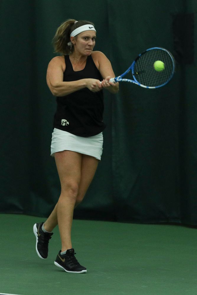 Iowa’s Ashleigh Jacobs returns a hit during the Iowa women’s tennis meet vs DePaul on Friday, February 21, 2020 at the Hawkeye Tennis and Recreation Complex. (Lily Smith/hawkeyesports.com)