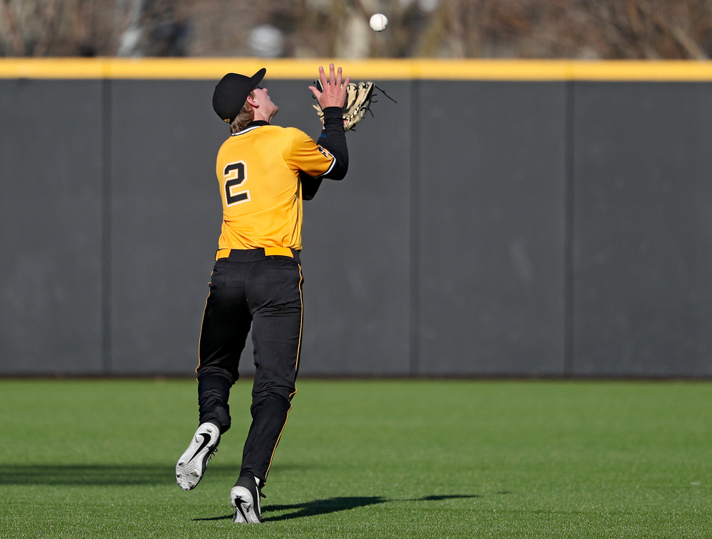 Iowa Hawkeyes shortstop Brendan Sher (2) pulls in a pop up for an out during the sixth inning of their game at Duane Banks Field in Iowa City on Tuesday, Apr. 2, 2019. (Stephen Mally/hawkeyesports.com)