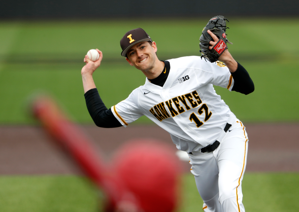 Iowa Hawkeyes pitcher Nick Nelsen (12) during a double header against the Indiana Hoosiers Friday, March 23, 2018 at Duane Banks Field. (Brian Ray/hawkeyesports.com)
