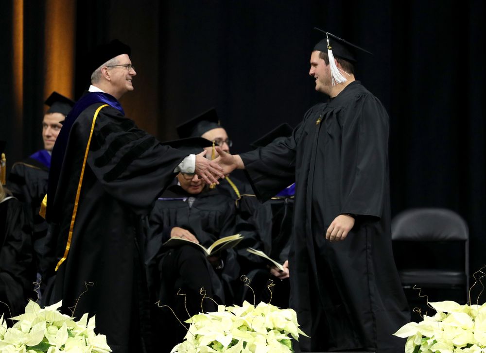 Iowa Football's Keegan Render during the Fall Commencement Ceremony Saturday, December 15, 2018 at Carver-Hawkeye Arena. (Brian Ray/hawkeyesports.com)