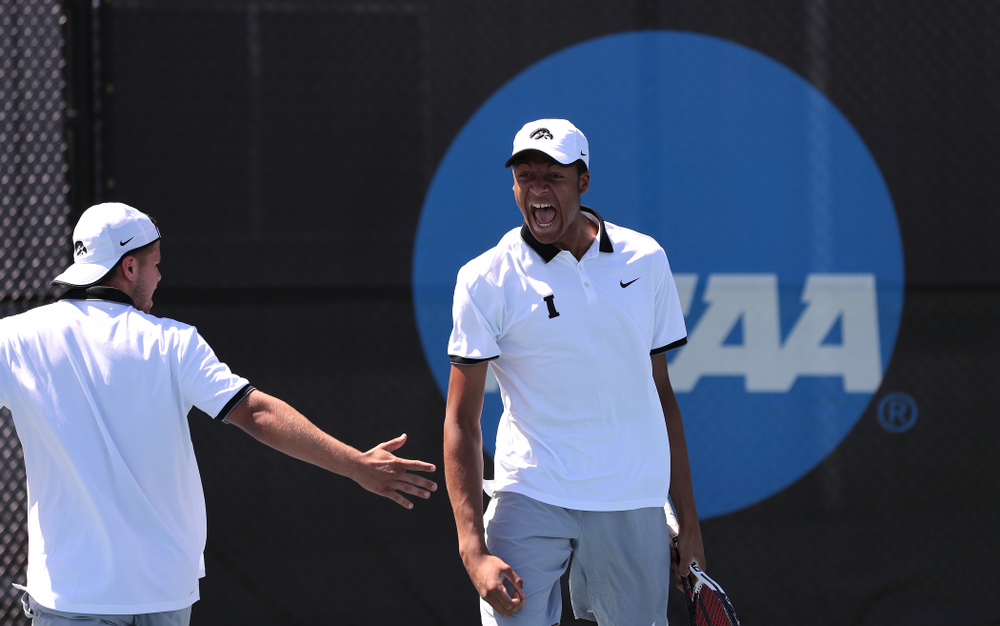 IowaÕs Oliver Okonkwo and Will Davies play a doubles match against the Michigan Wolverines Sunday, April 21, 2019 at the Hawkeye Tennis and Recreation Complex. (Brian Ray/hawkeyesports.com)