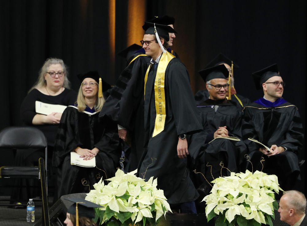 Iowa Swimming's Jerzy Twarowski during the Fall Commencement Ceremony Saturday, December 15, 2018 at Carver-Hawkeye Arena. (Brian Ray/hawkeyesports.com)
