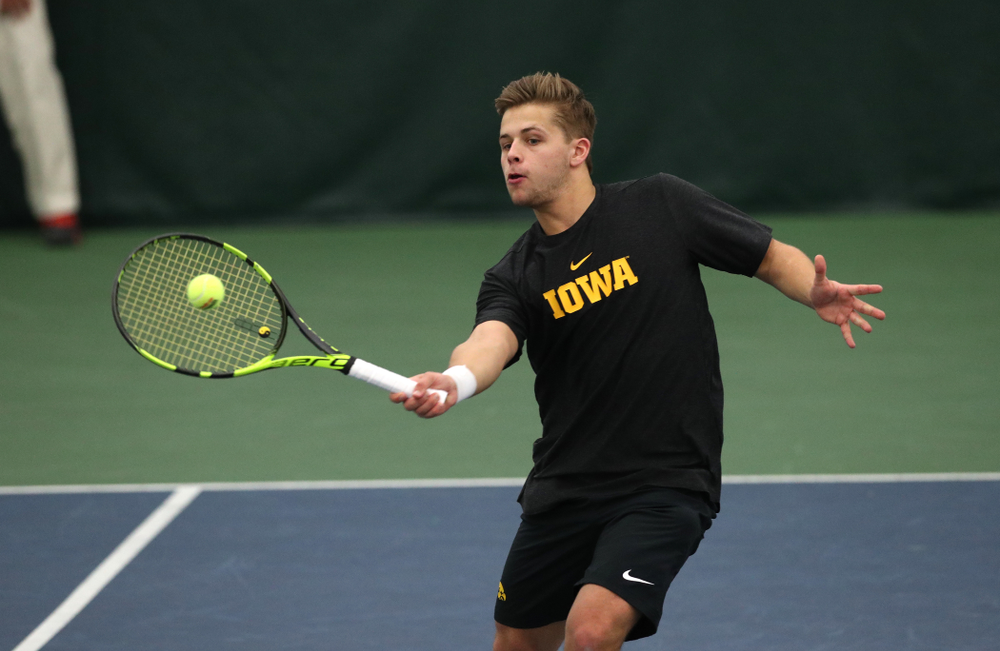 Will Davies and Oliver Okonkwo plays a doubles match against the Miami Hurricanes Friday, February 8, 2019 at the Hawkeye Tennis and Recreation Complex. (Brian Ray/hawkeyesports.com)