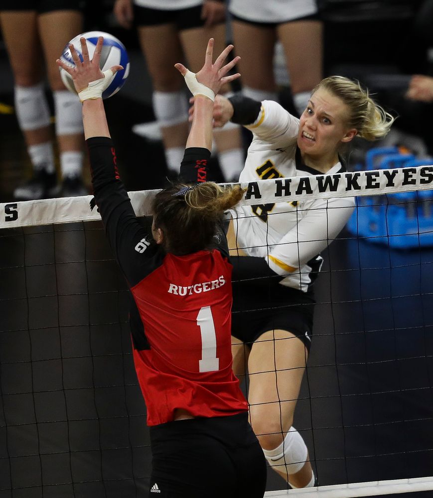 Iowa Hawkeyes right side hitter Reghan Coyle (8) spikes the ball during a match against Rutgers at Carver-Hawkeye Arena on November 2, 2018. (Tork Mason/hawkeyesports.com)