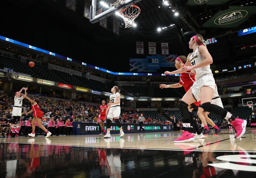 Iowa Hawkeyes guard Makenzie Meyer (3) knocks down a three point basket against the Rutgers Scarlet Knights in the semi-finals of the Big Ten Tournament Saturday, March 9, 2019 at Bankers Life Fieldhouse in Indianapolis, Ind. (Brian Ray/hawkeyesports.com)
