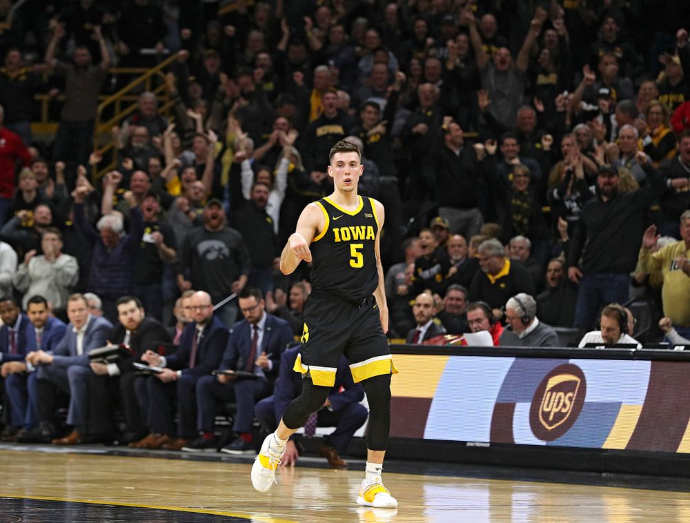 Iowa Hawkeyes guard CJ Fredrick (5) celebrates after making a 3-pointer during the second half of their game at Carver-Hawkeye Arena in Iowa City on Monday, January 27, 2020. (Stephen Mally/hawkeyesports.com)