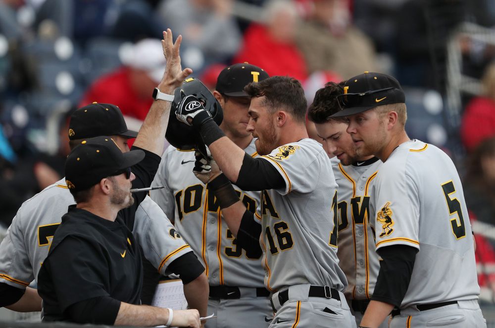 Iowa Hawkeyes Tanner Wetrich (16) scores against the Indiana Hoosiers in the first round of the Big Ten Baseball Tournament Wednesday, May 22, 2019 at TD Ameritrade Park in Omaha, Neb. (Brian Ray/hawkeyesports.com)