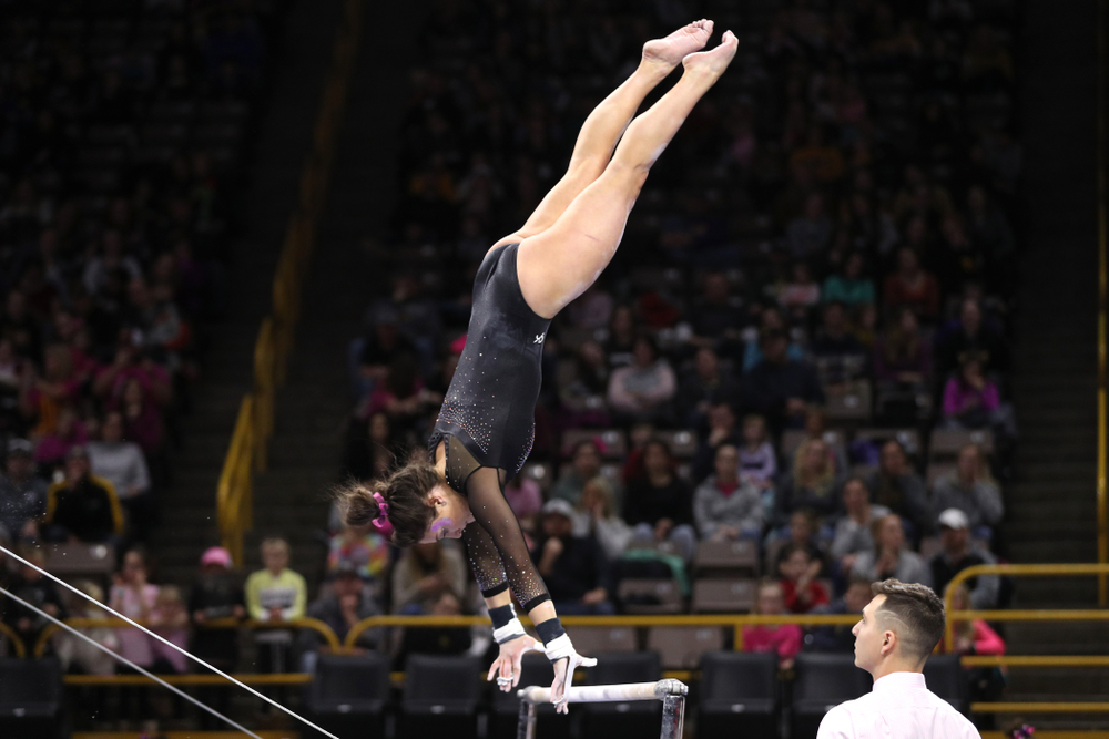 Iowa's Jax Krantz competes on the bars during their meet against the Minnesota Golden Gophers Saturday, January 19, 2019 at Carver-Hawkeye Arena. (Brian Ray/hawkeyesports.com)