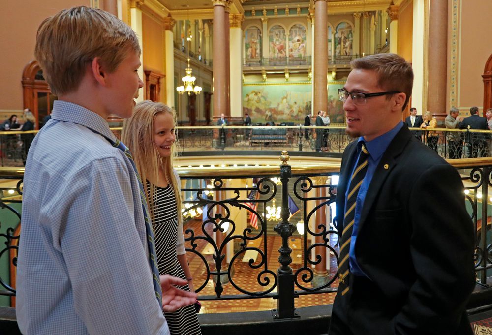 Iowa's Spencer Lee talks with young fans at the Iowa State Capitol Building on Tuesday, Apr. 9, 2019. (Stephen Mally/hawkeyesports.com)