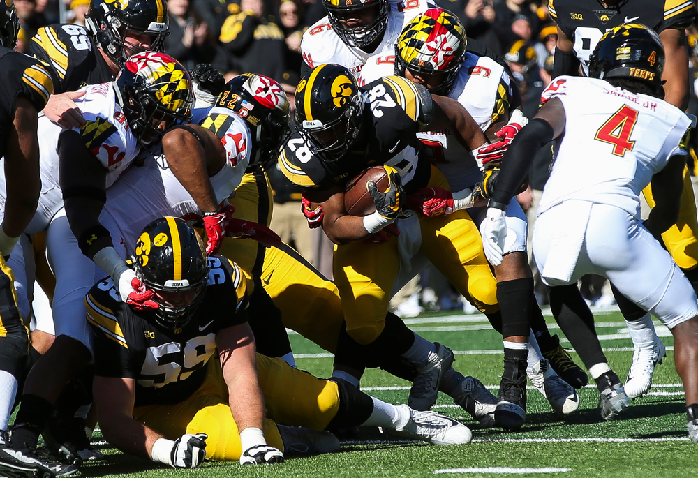 Iowa Hawkeyes running back Toren Young (28) runs the ball during a game against Maryland at Kinnick Stadium on October 20, 2018. (Tork Mason/hawkeyesports.com)