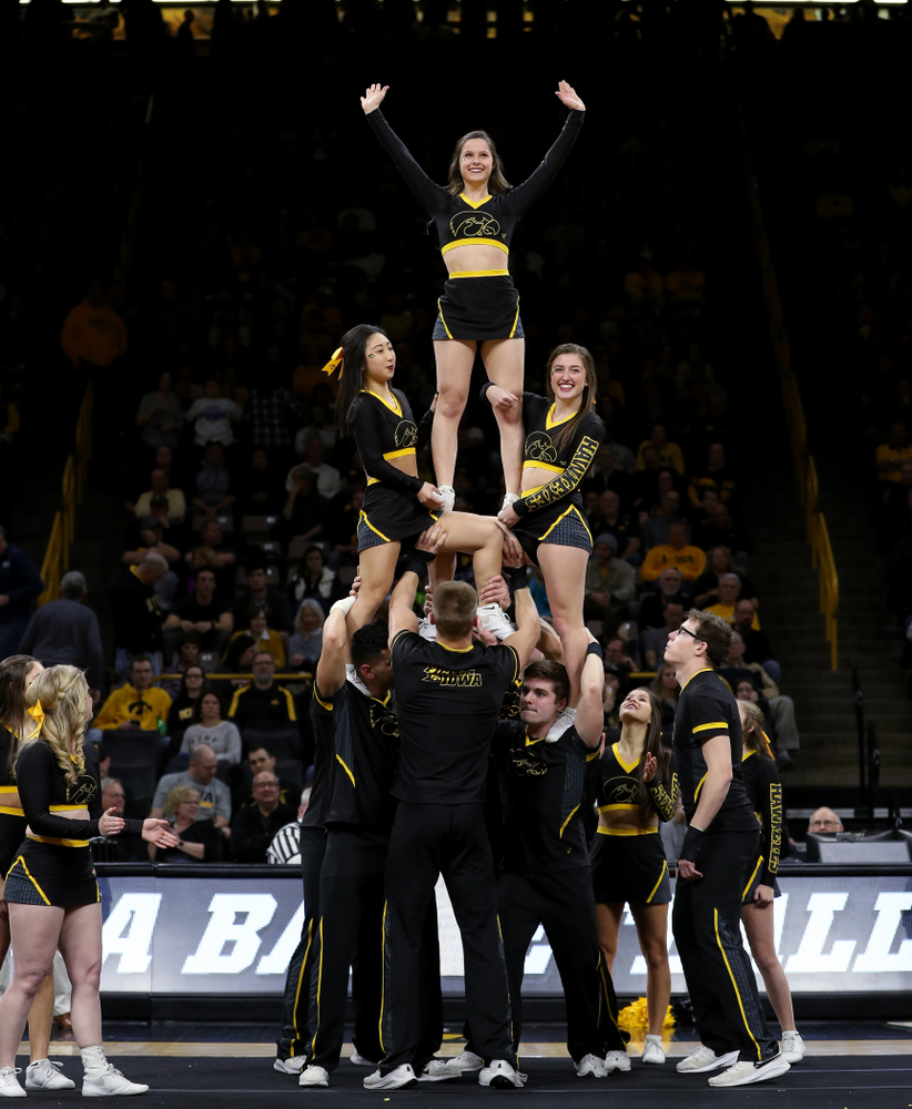 The Iowa Cheerleaders and Dance Team perform on senior night at half-time of the Iowa Hawkeyes game against the Purdue Boilermakers Tuesday, March 3, 2020 at Carver-Hawkeye Arena. (Brian Ray/hawkeyesports.com)