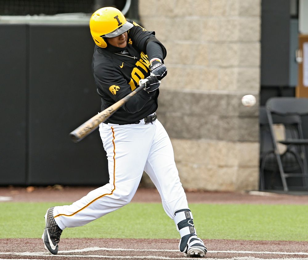 Iowa Hawkeyes first baseman Izaya Fullard (20) bats during the first inning of their game against Illinois at Duane Banks Field in Iowa City on Saturday, Mar. 30, 2019. (Stephen Mally/hawkeyesports.com)
