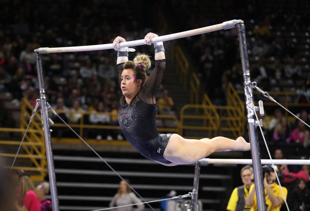 Iowa's Maddie Kampschroeder competes on the bars during their meet against the Minnesota Golden Gophers Saturday, January 19, 2019 at Carver-Hawkeye Arena. (Brian Ray/hawkeyesports.com)