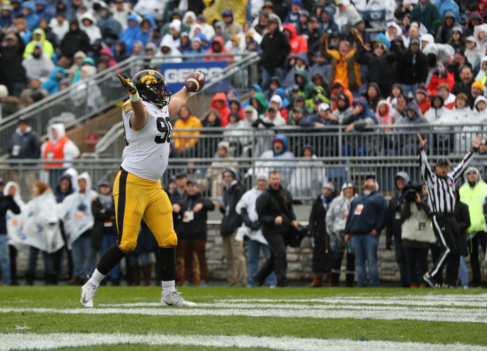 Iowa Hawkeyes defensive end Sam Brincks (90) catches a touchdown pass against the Penn State Nittany Lions Saturday, October 27, 2018 at Beaver Stadium in University Park, Pa. (Brian Ray/hawkeyesports.com)