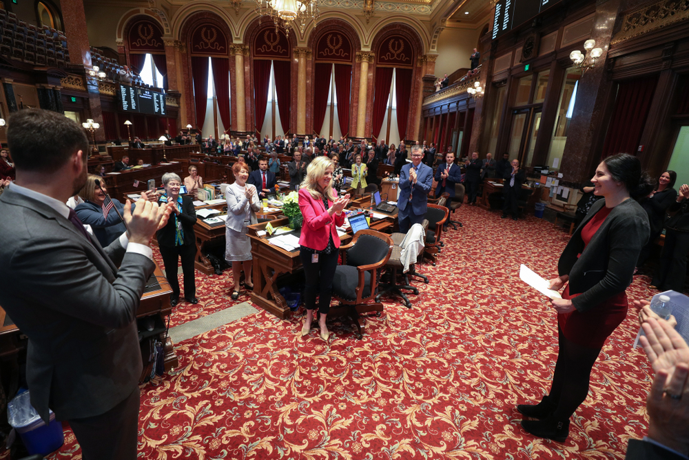 Iowa’s Megan Gustafson shakes hands with state senator Zach Wahls after being recognized with a resolution in the senate chamber at the Iowa State Capitol Wednesday, April 24, 2019 in Des Moines. (Brian Ray/hawkeyesports.com)