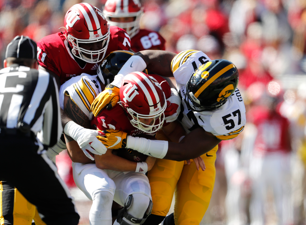 Iowa Hawkeyes defensive end A.J. Epenesa (94) and defensive end Chauncey Golston (57) against the Indiana Hoosiers Saturday, October 13, 2018 at Memorial Stadium, in Bloomington, Ind. (Brian Ray/hawkeyesports.com)