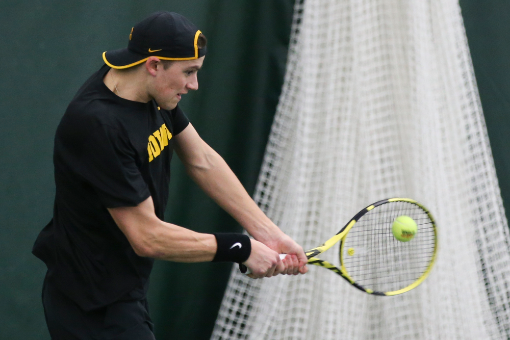 Iowa’s Joe Tyler returns a hit during the Iowa men’s tennis meet vs VCU on Saturday, February 29, 2020 at the Hawkeye Tennis and Recreation Complex. (Lily Smith/hawkeyesports.com)