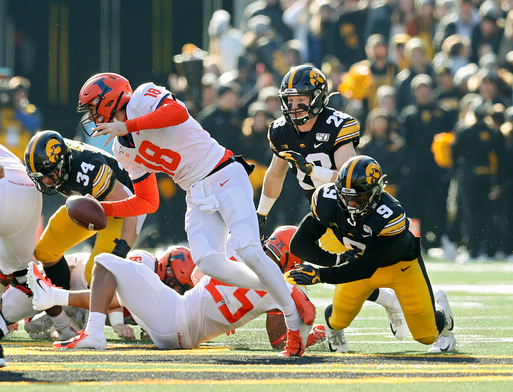 Iowa Hawkeyes defensive back Geno Stone (9) sacks Illinois Fighting Illini quarterback Brandon Peters (18) during the second quarter of their game at Kinnick Stadium in Iowa City on Saturday, Nov 23, 2019. (Stephen Mally/hawkeyesports.com)