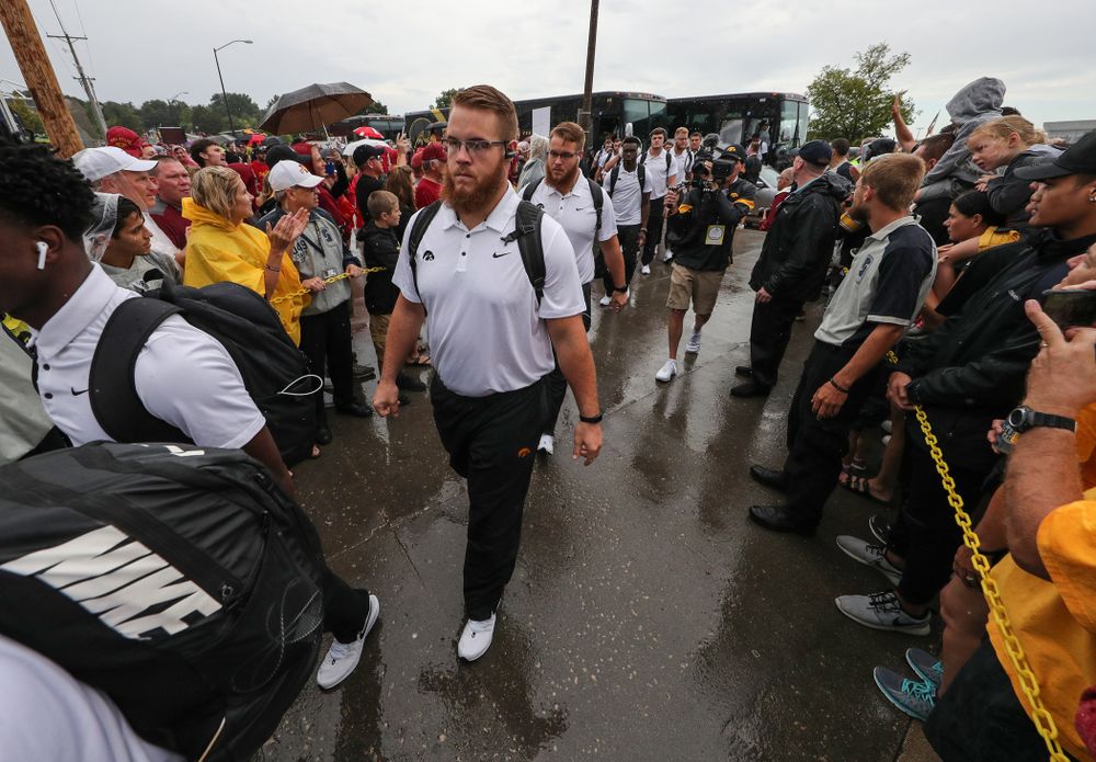 Iowa Hawkeyes offensive lineman Levi Paulsen (66) and offensive lineman Landan Paulsen (68) arrive for their game against the Iowa State Cyclones Saturday, September 14, 2019 at Jack Trice Stadium in Ames, Iowa. (Brian Ray/hawkeyesports.com)