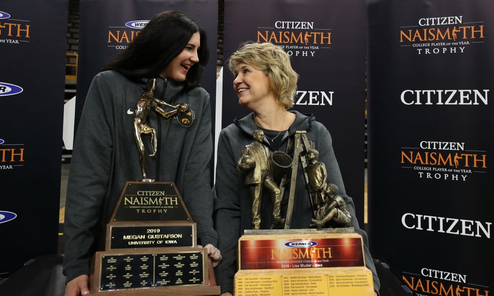 Iowa Hawkeyes forward Megan Gustafson (10) with the Naismith Player Of The Year Trophy and head coach Lisa Bluder with the Naismith Coach Of the Year Trophy during the teamÕs Celebr-Eight event Wednesday, April 24, 2019 at Carver-Hawkeye Arena. (Brian Ray/hawkeyesports.com)