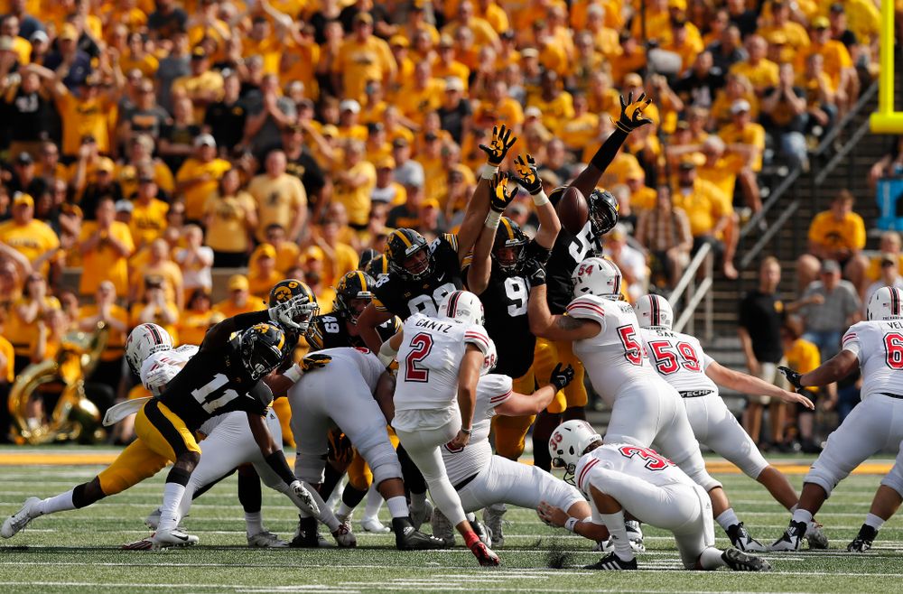 Iowa Hawkeyes defensive end Anthony Nelson (98), defensive end Matt Nelson (96), and defensive end Chauncey Golston (57) against the Northern Illinois Huskies Saturday, September 1, 2018 at Kinnick Stadium. (Brian Ray/hawkeyesports.com)
