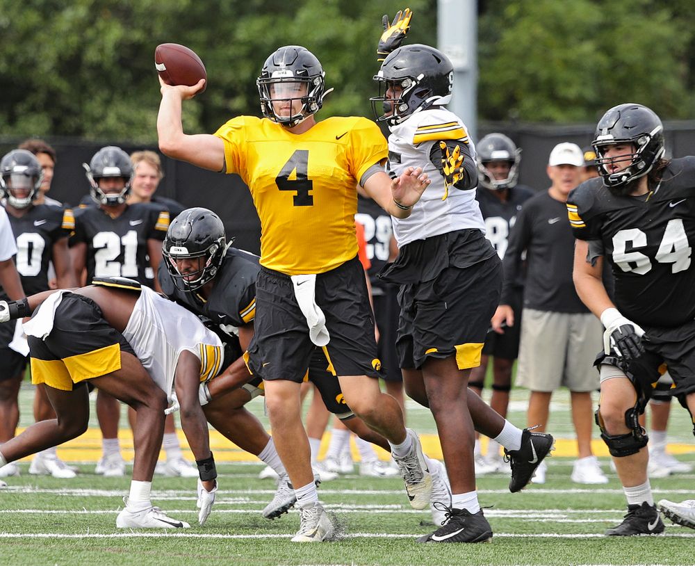 Iowa Hawkeyes defensive lineman Cedrick Lattimore (95) pressures quarterback Nate Stanley (4) during Fall Camp Practice No. 15 at the Hansen Football Performance Center in Iowa City on Monday, Aug 19, 2019. (Stephen Mally/hawkeyesports.com)