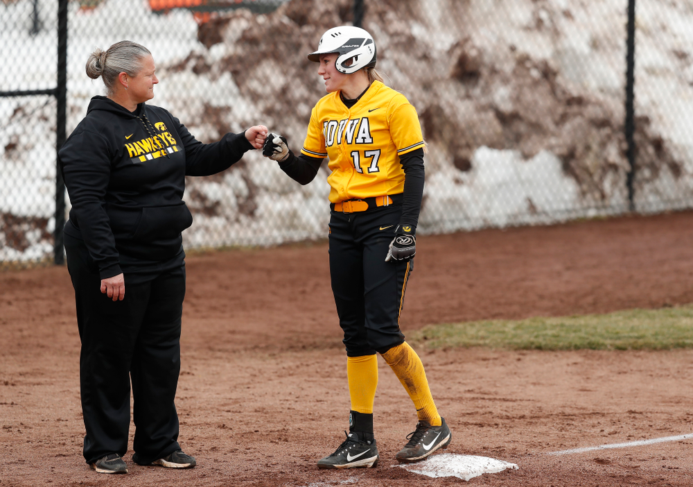 Iowa Hawkeyes outfielder Allie Wood (17) and head coach Marla Looper against UW Green Bay Tuesday, March 27, 2018 at Bob Pearl Field. (Brian Ray/hawkeyesports.com)