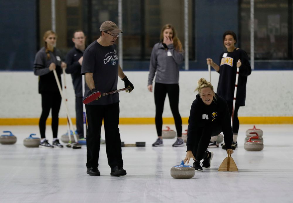 Members of the Iowa Softball team learn the sport of curling as part of a team building event Wednesday, January 10, 2018 at the Cedar Rapids Ice Arena. (Brian Ray/hawkeyesports.com)