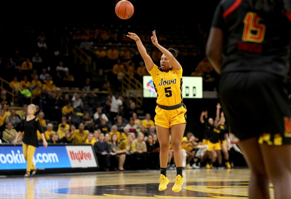 Iowa Hawkeyes guard Alexis Sevillian (5) knocks down a three point basket against the Maryland Terrapins Thursday, January 9, 2020 at Carver-Hawkeye Arena. (Brian Ray/hawkeyesports.com)