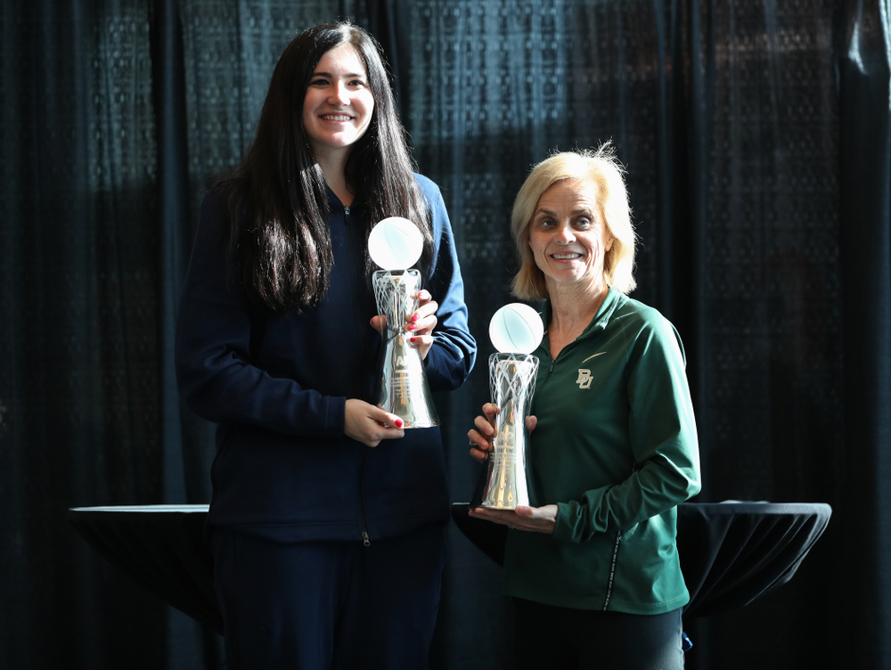 Iowa Hawkeyes forward Megan Gustafson (10) stands with Baylor Lady Bears head coach Kim Mulkey during a news conference to announce that Gustafson had won the AP Player of the Year and Mulkey had won the AP Coach of the Year Wednesday, April 4, 2018 at Amalie Arena in Tampa, FL. (Brian Ray/hawkeyesports.com)