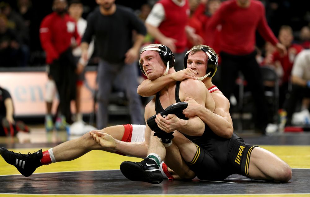 Iowa’s Kaleb Young wrestles Nebraska’s Peyton Rob at 157 pounds Saturday, January 18, 2020 at Carver-Hawkeye Arena. Young won the match 6-4. (Brian Ray/hawkeyesports.com)