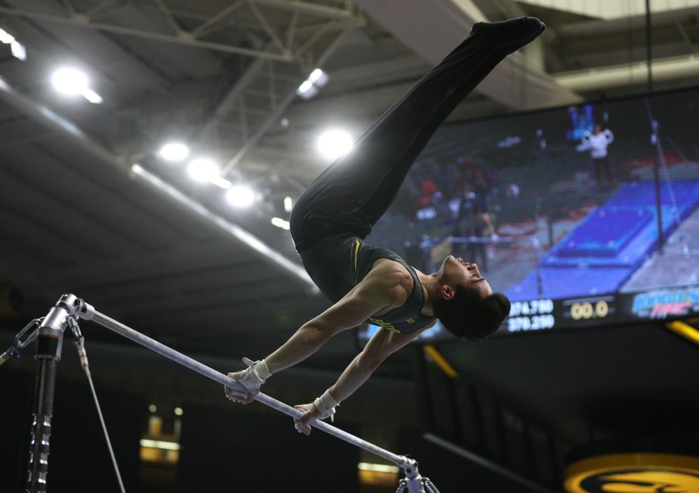 Iowa's Andrew Herrador competes on the high bar against the Ohio State Buckeyes Saturday, March 16, 2019 at Carver-Hawkeye Arena. (Brian Ray/hawkeyesports.com)